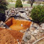 Pond Installation - Digging out the cavity for the liner for the pondless waterfall.