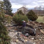 Installing the pond liner to the pondless waterfall.